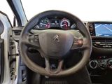 the interior of a car with a steering wheel and dashboard controls