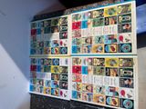 a wall with a bunch of different comics on it