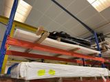 a rack with a lot of items on it in a warehouse