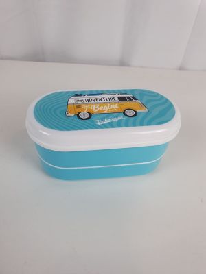 une boîte à repas bleue et blanche sur laquelle est représenté un bus jaune
