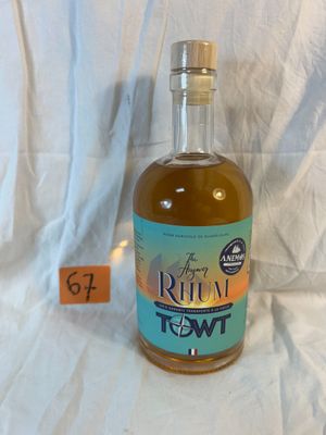 a bottle of rum that is sitting on a table