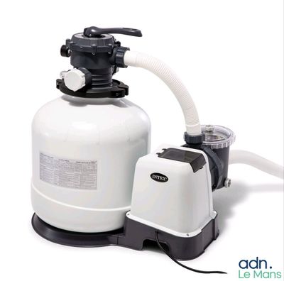 an image of a sand filterer with a hose attached to it