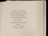 an open book with a picture of a clock on it