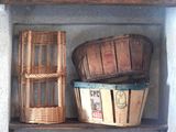two baskets and a basket on a shelf in a room
