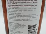 an image of a bottle of liquid with a label on it
