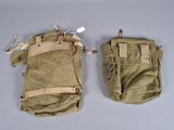 pair of tan canvas utility pouchs on grey surface