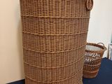 an image of a wicker basket sitting on top of a blue table