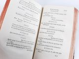 an open book that is sitting on a table