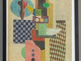 tableau représentant des formes et des couleurs abstraites, encadré de noir, accroché au mur