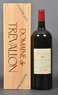 a bottle of red wine next to a wooden box