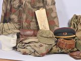 a lot of military items that are on a table
