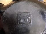 a close up of a metal object on a table