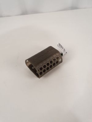 a close up of a piece of metal on a white surface