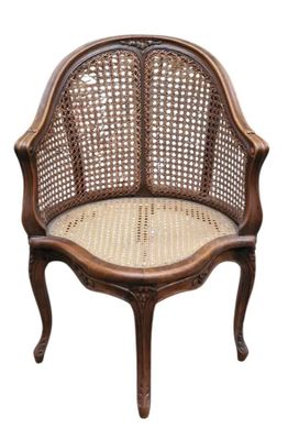 an image of a wicker chair on a white background