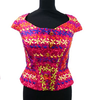 a picture of a woman ' s top on a mannequin mannequin