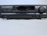 sony cd player with remote control on a white surface