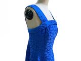 blue dress on a mannequin mannequin with a white background