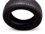 a close up of a tire on a white background