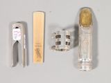 a toothbrush, toothpaste, and other items that are on a table