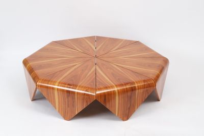 an image of a wooden coffee table with a starburst design