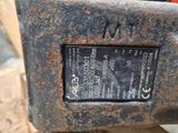 a close up of a metal object with a label on it