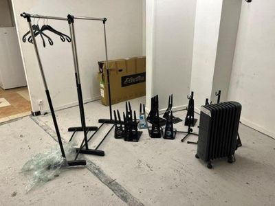 a lot of tools that are laying out on the floor