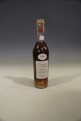 an image of a bottle of wine sitting on a table