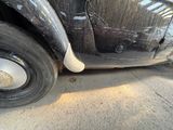a close up of a car with a broken tire