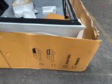 a cardboard box with a picture of a car inside of it