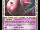un gros plan sur une carte Pokémon représentant un visage rose