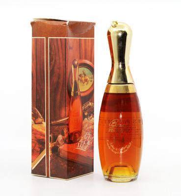 an image of a bottle of perfume sitting next to a box