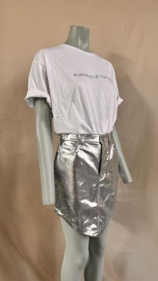 silver metallic mini skirt and t - shirt on mannequin mannequin