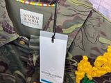 a close up of a shirt with a tag on it