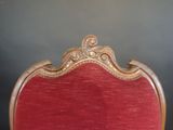an image of a red chair with a gold frame