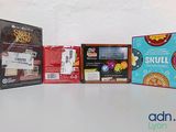 three boxes of food sitting on a table next to each other