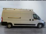 a white van that is parked in a room