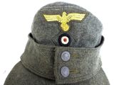 an image of a military hat with a gold eagle on it