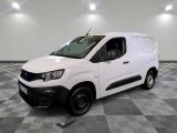 the white van is parked on a checkered tile floor