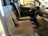 the interior of a car with a seat belt and a steering wheel