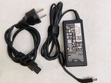 a charger that is plugged into a laptop