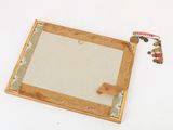 a picture of a piece of wood with a piece of paper attached to it
