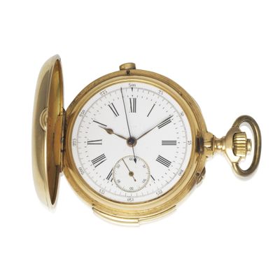 a gold pocket watch with roman numerals on it