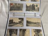 an open suitcase with a bunch of old photos inside of it