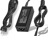 une image représentant un chargeur d'ordinateur portable muni d'un câble