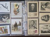 a lot of stamps on the inside of a binder