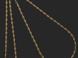 un collier en or dont la chaîne a été coupée en deux