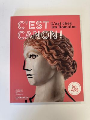 a book with a picture of a woman ' s face on it