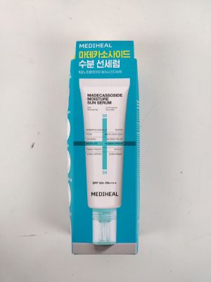 a close up of a tube of toothpaste on a white surface