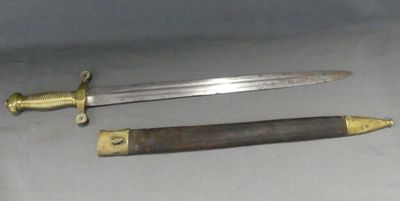 two different types of knives on display on a table