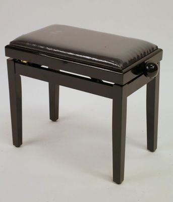 a black piano bench with a black seat on a white background